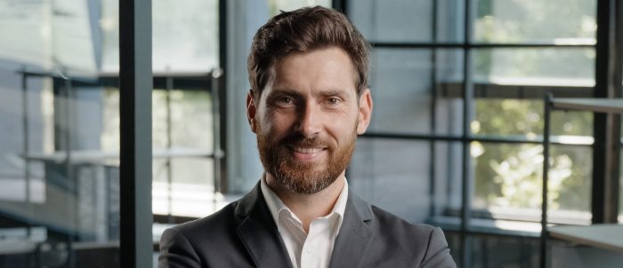 Caucasian 40s middle-aged adult bearded successful boss investor entrepreneur employer business man leader lawyer in office posing confident strong pose position with crossed folded hands arms smiling. High quality 4k footage